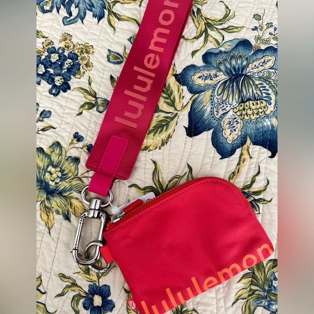 BNWT & BNWOT Lululemon clip. pouch in mango & Never Lost Keychain in raspberry